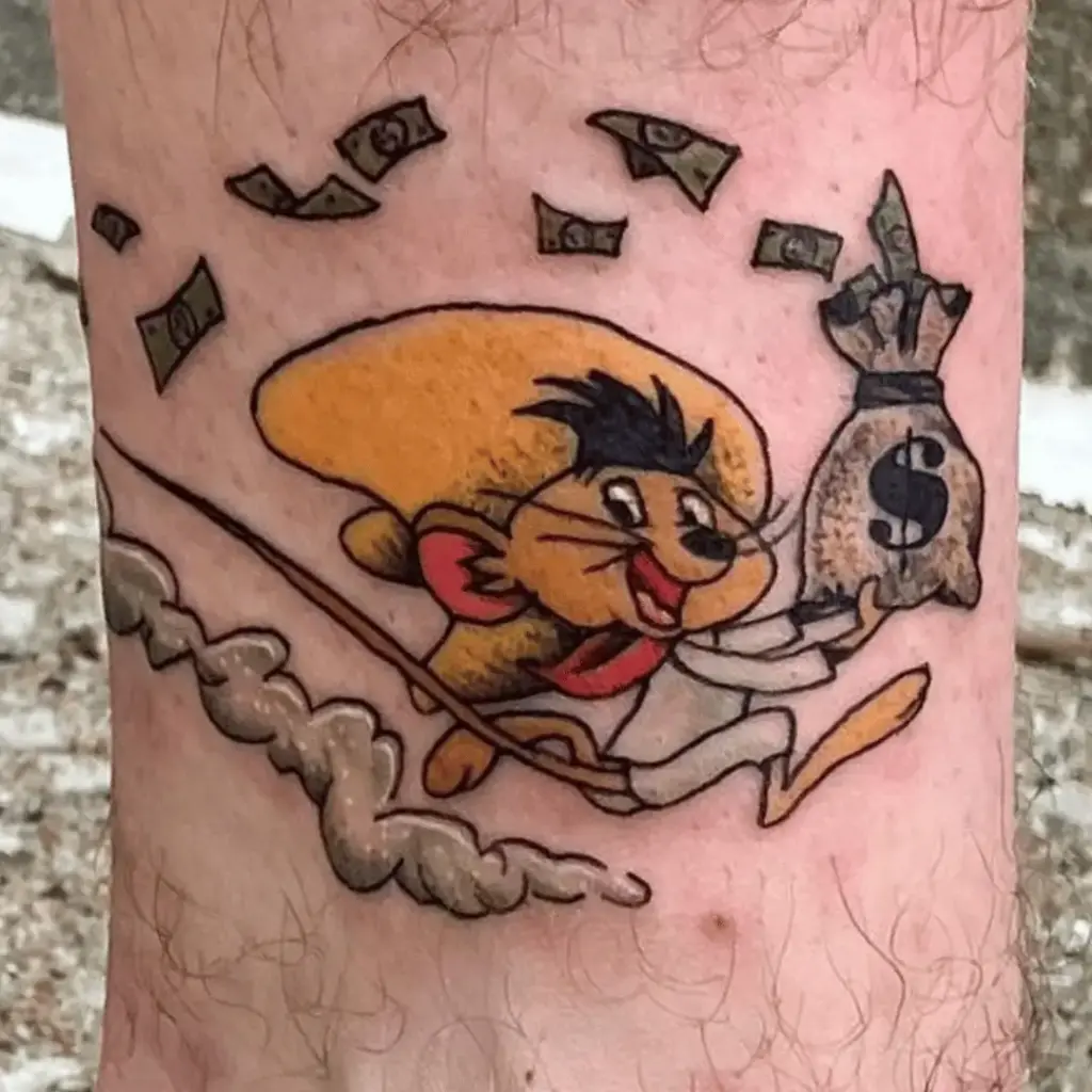 Small Speedy Gonzales tattoo positioned near the ankle