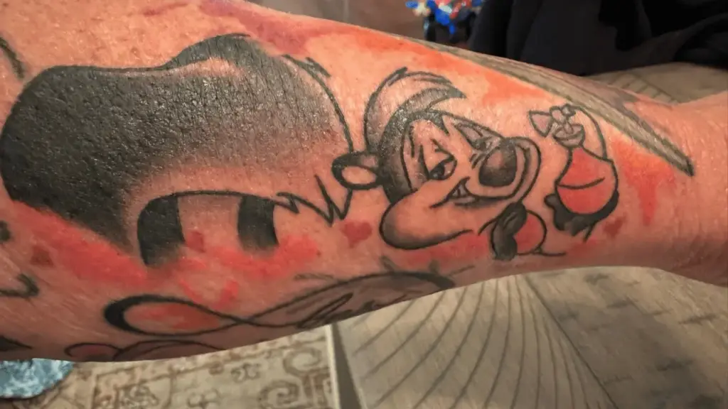 Pepé Le Pew tattoo design featuring a decorative perfume bottle