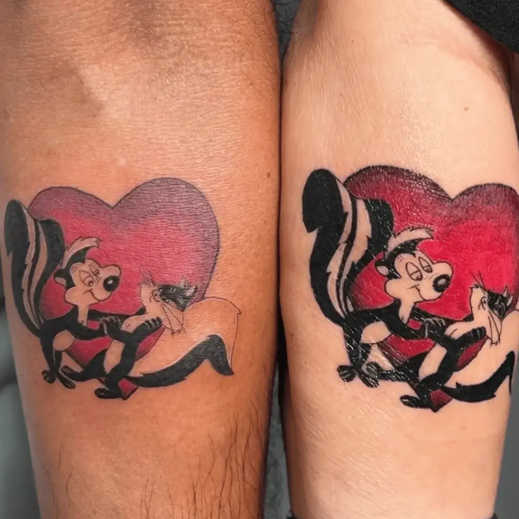 Pepé Le Pew matching tattoo design with coordinated cartoon poses
