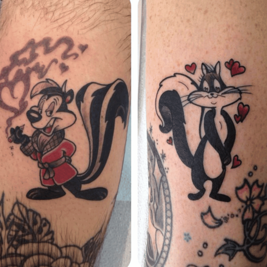 Matching Pepé Le Pew and Penelope character tattoos