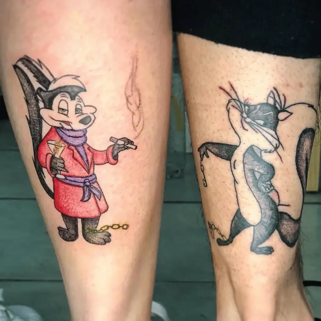 Matching Pepé Le Pew and Penelope Pussycat tattoo set