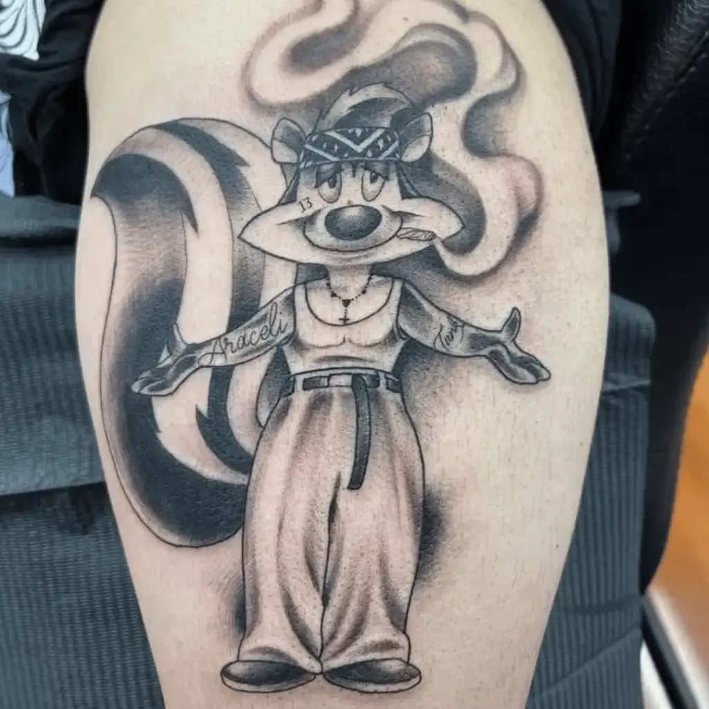 Full-color Pepe Le Pew portrait tattoo on the lower leg