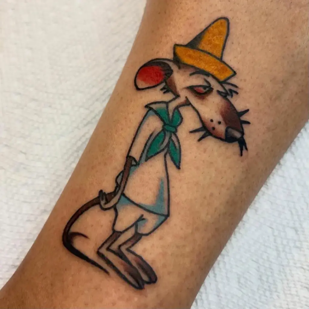Slowpoke Rodriguez cartoon tattoo on the lower leg