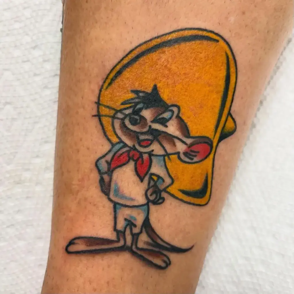 Full-color Speedy Gonzales and Slowpoke Rodriguez tattoo on the leg