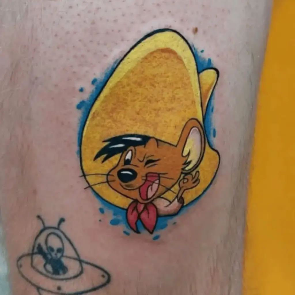 Small full-color Speedy Gonzales tattoo on the lower leg