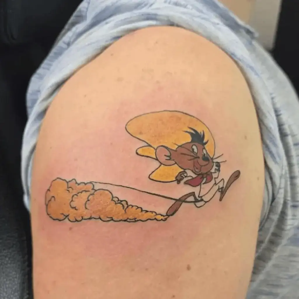 Full-color Speedy Gonzales tattoo on the upper arm