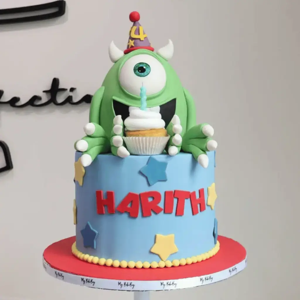 Green one-eye monster cake inspired by Mike Wazowski with fondant horns