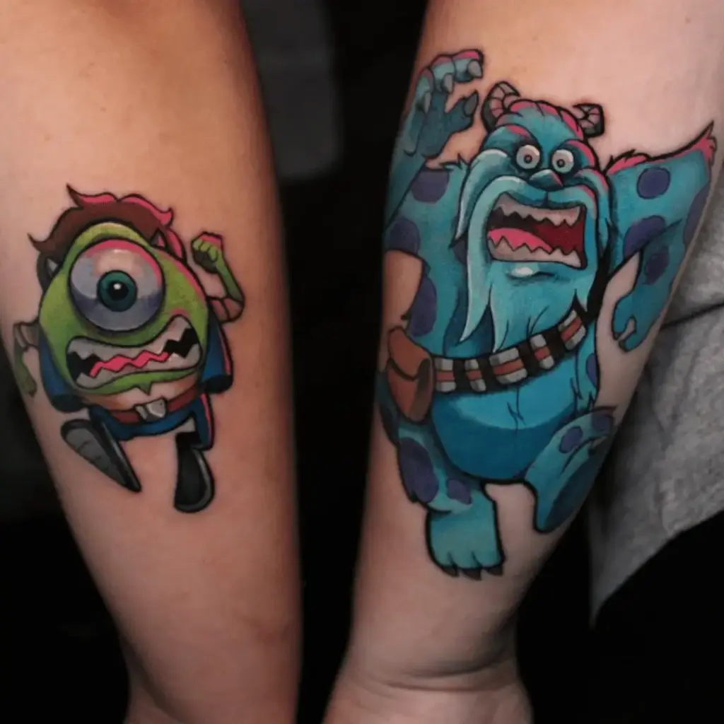 Matching Mike Wazowski and Sulley tattoos on two people