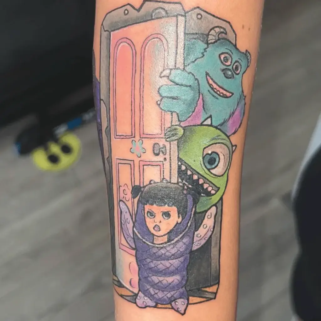 Detailed Mike Wazowski and Pixar character tattoo sleeve