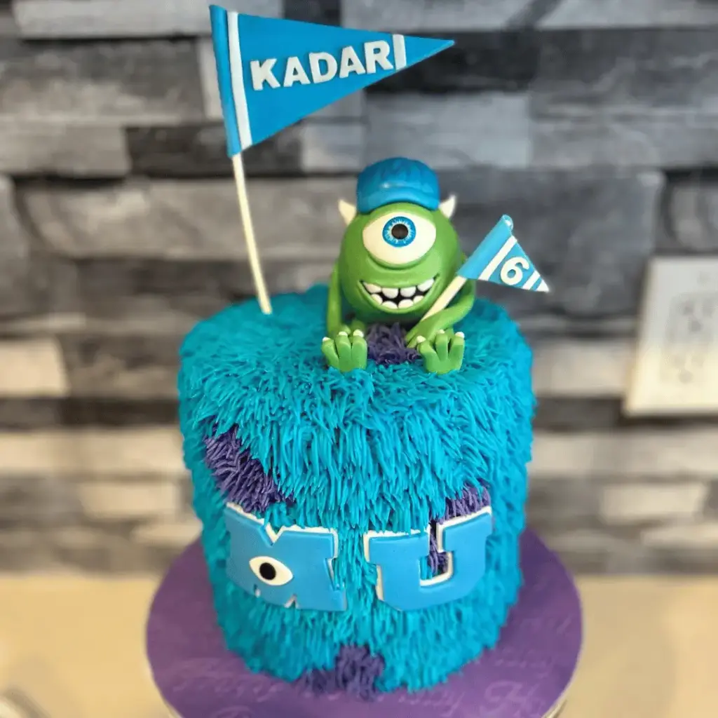 Tall 3D Mike Wazowski character cake made with green fondant and sugarpaste details