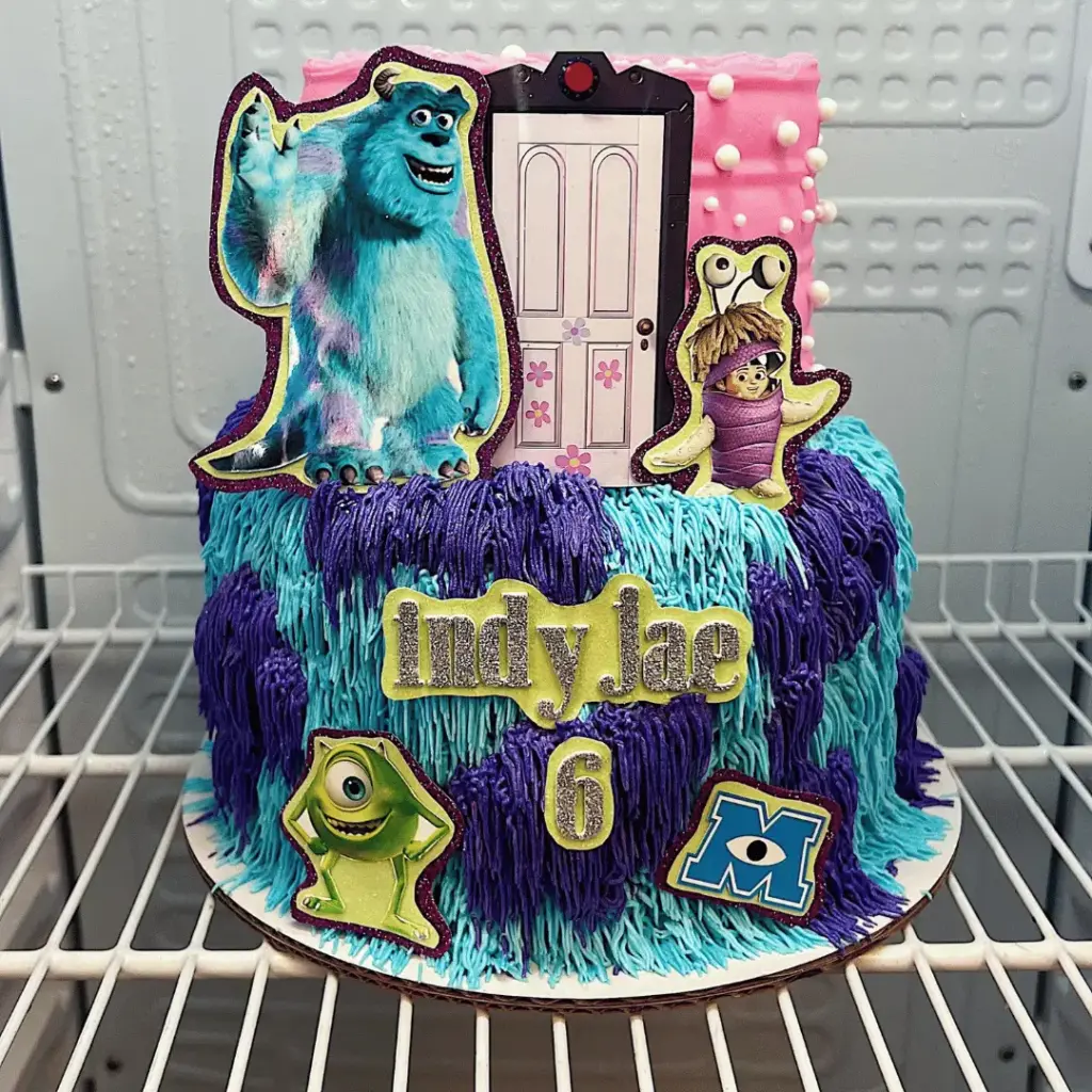 Two-tier Monsters Inc cake with Mike Wazowski, Sulley fur and Boo's bedroom door