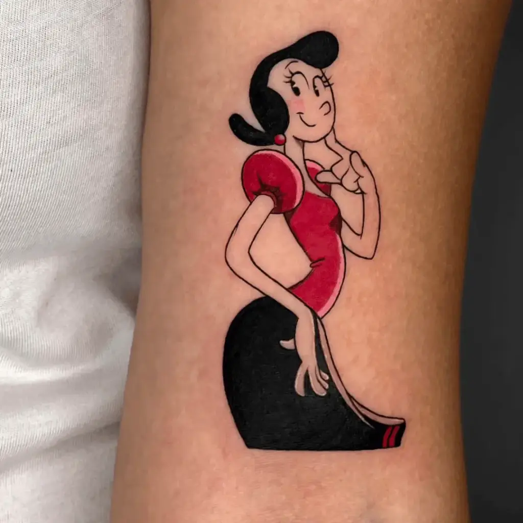 Olive Oyl tattoo on the inner arm in full color