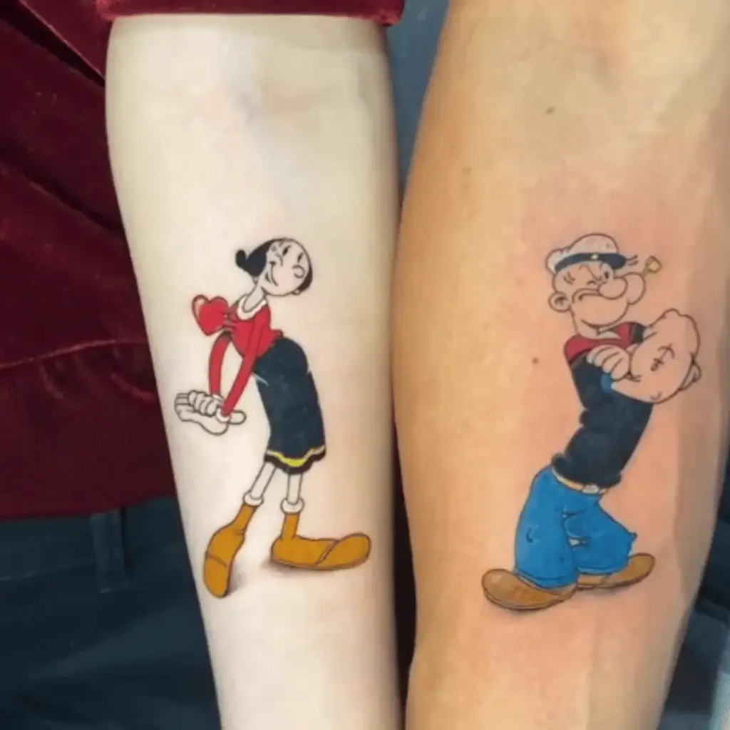 Matching Popeye and Olive Oyl tattoos on two people