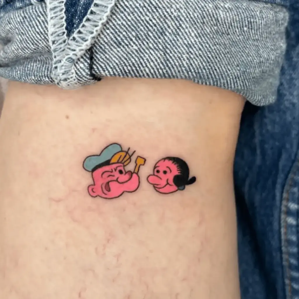 Small Popeye and Olive Oyl couple tattoo