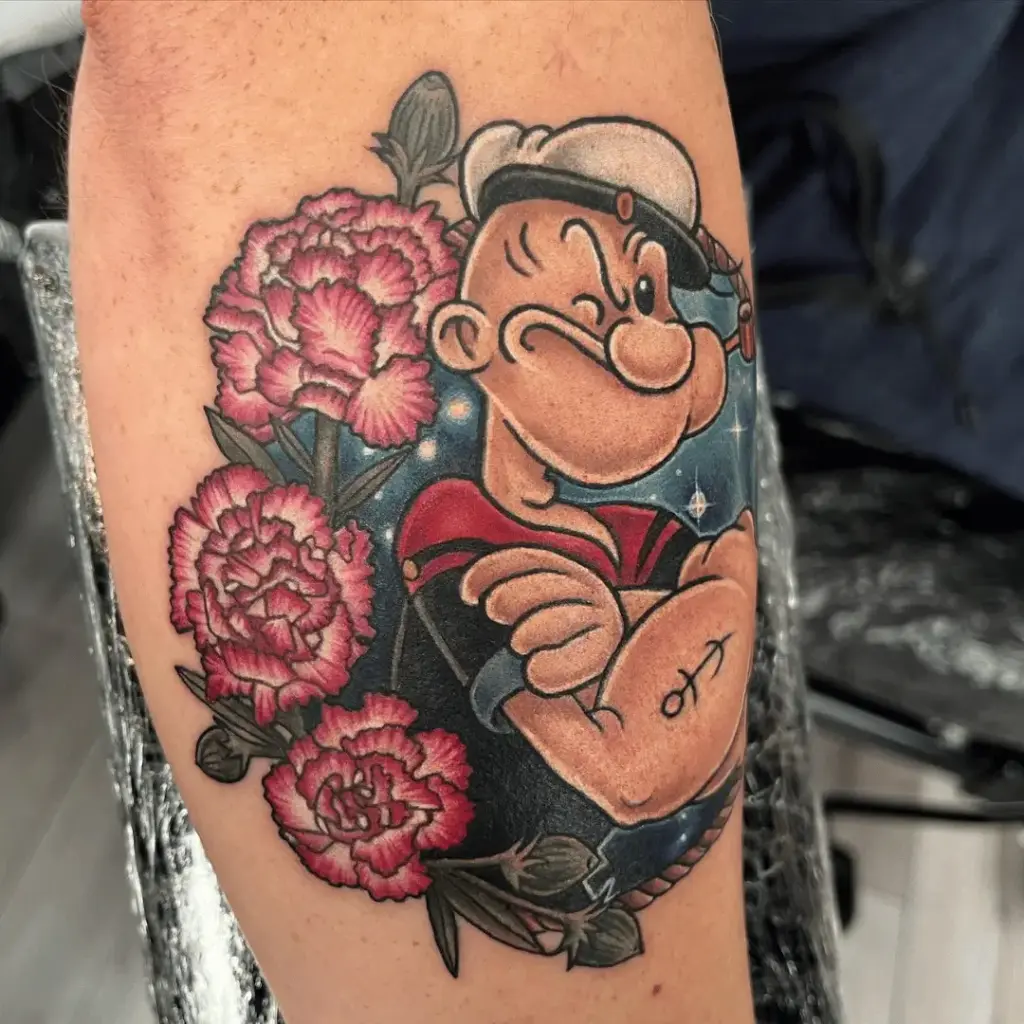 Small full-color Popeye tattoo on the lower leg