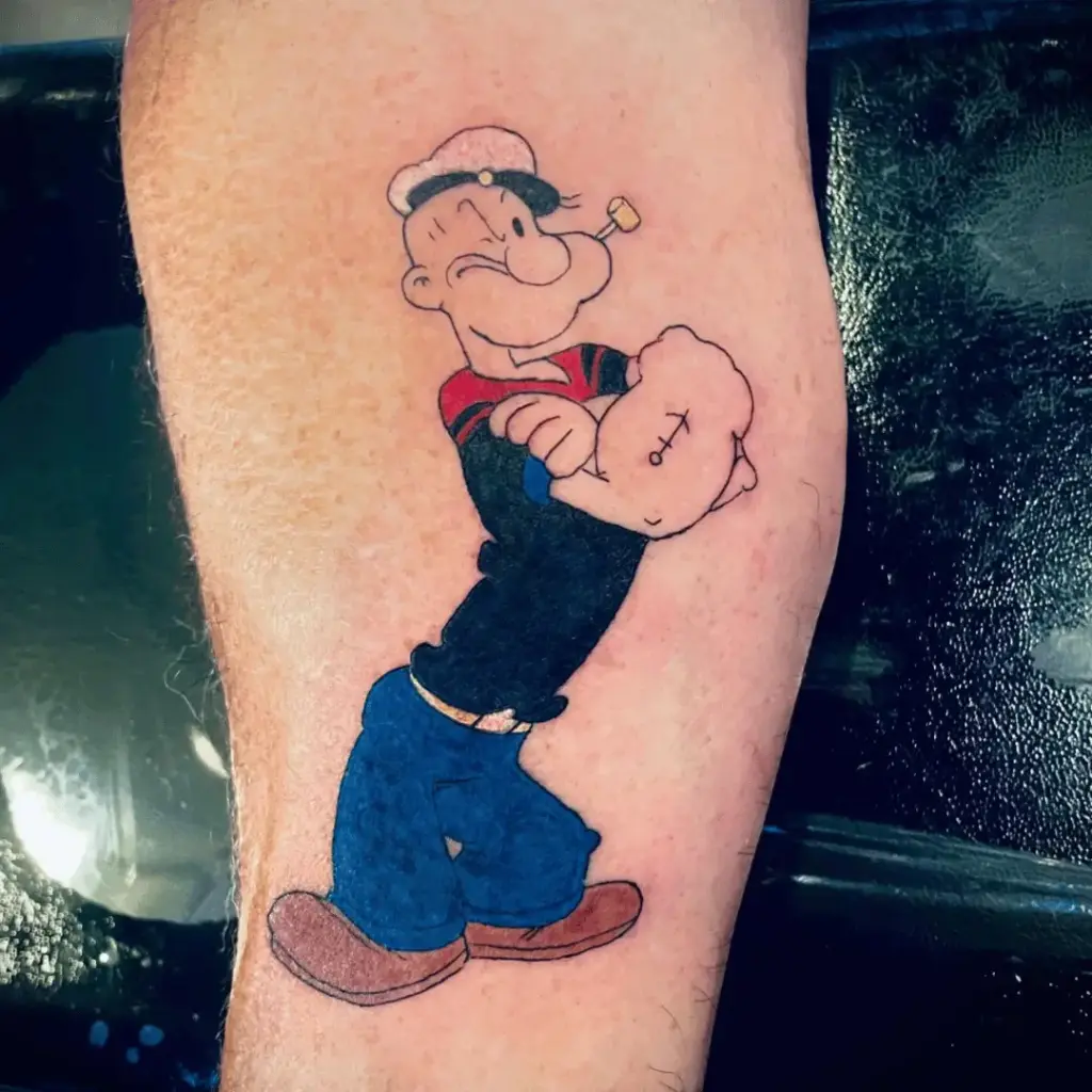 Small Popeye tattoo with simple linework and color