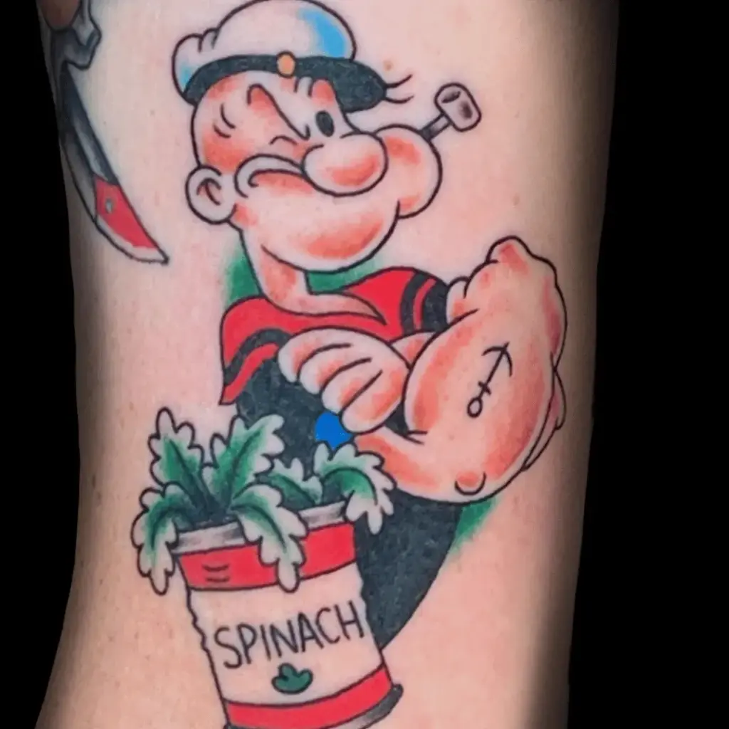 Full-color Popeye tattoo showing the sailor holding spinach