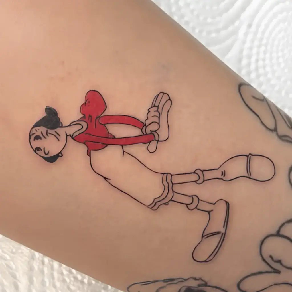 Classic Olive Oyl tattoo with bold black outlines
